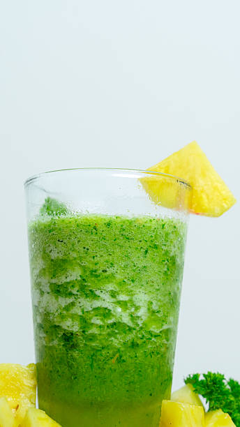 Healthy green detox smoothie with pineapple and parsley