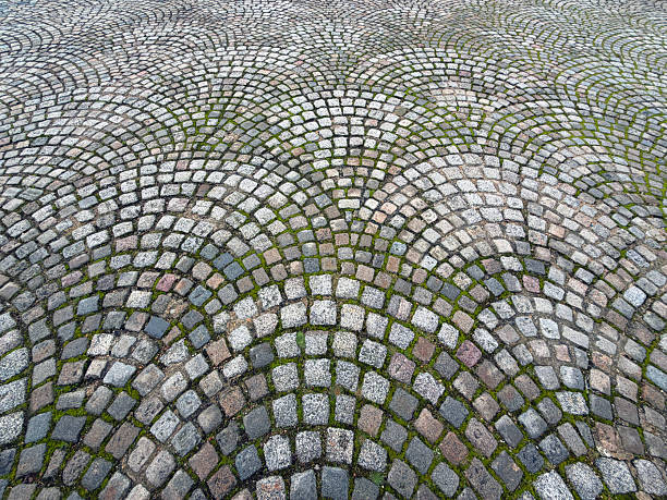 Up near the Prime Meridian is an ancient, hand-laid stone path in a fish scales pattern. It's been lovingly cared for over the years. Just a touch of greenery sprouts up through the cracks. 2026