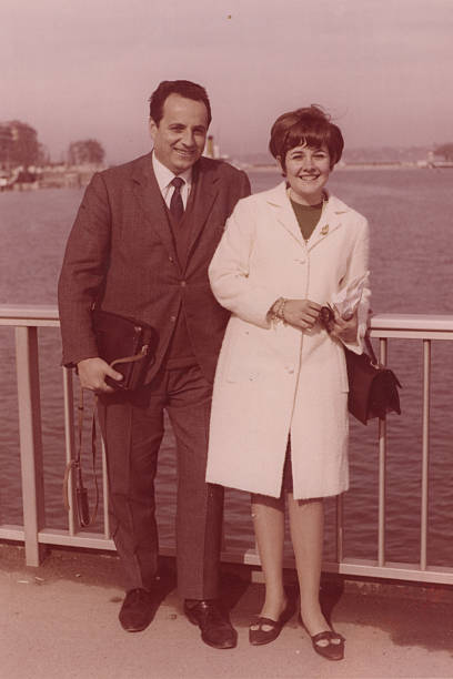 Image taken in the 1960s: Smiling young couple posing in Geneva, Switzerland