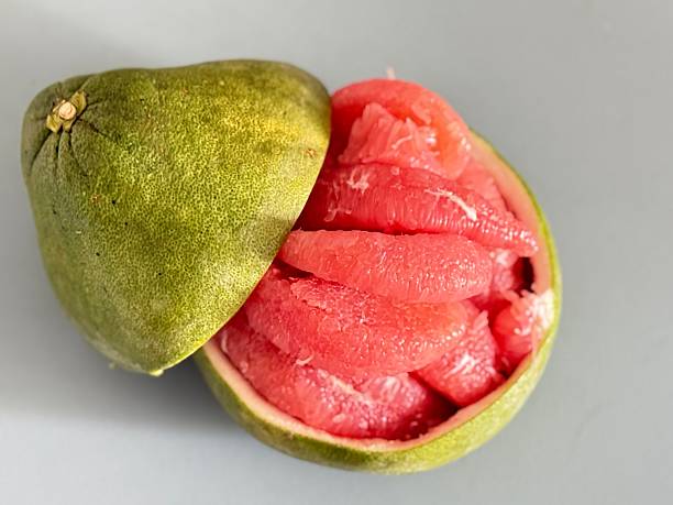 Freshly peeled Imported Thailand Pink Pomelo