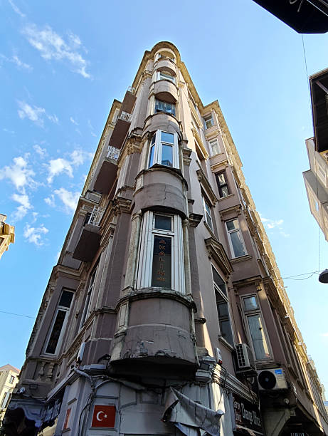 Old fashioned corner residential building in the Beyoğlu district of Istanbul, Turkey.