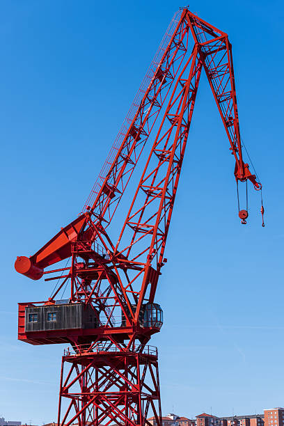 Detail of an old metal dock crane structure used for loading and unloading ships along the Nervión River in Bilbao Spain