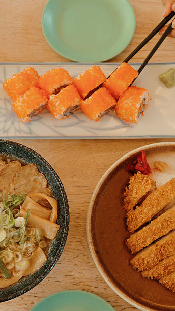 A mouthwatering selection of Japanese food including sushi, ramen, and curry rice