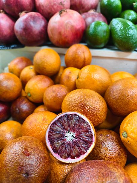 Fresh fruits: blood oranges, pomegranates and avocados