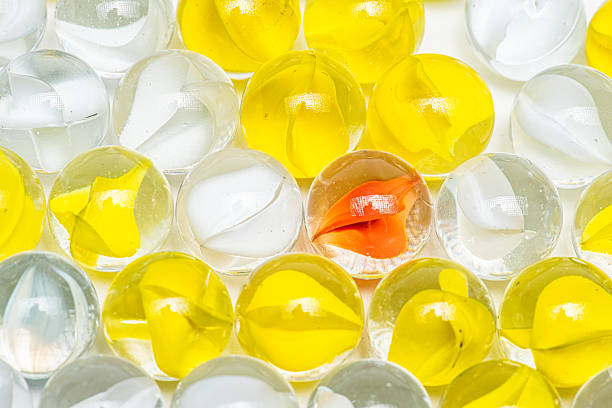 Colorful glass marbles pattern with single contrasting accent.