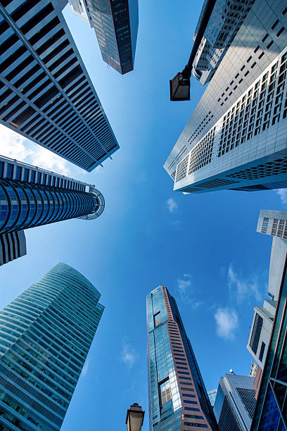 Business skyscrapers in the Financial District on blue sky in downtown at Singapore.