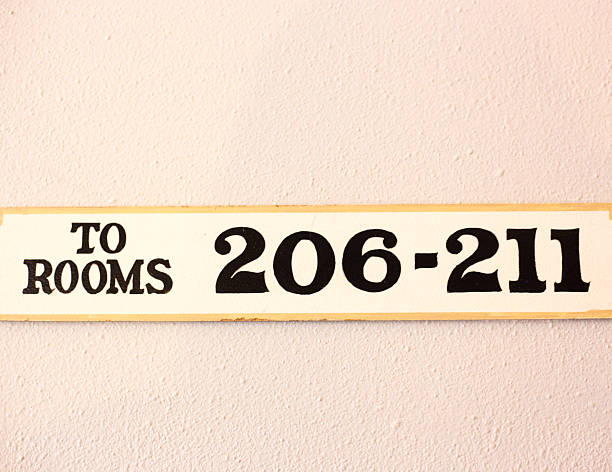 Sign on Hotel Wall: To Rooms 206-211