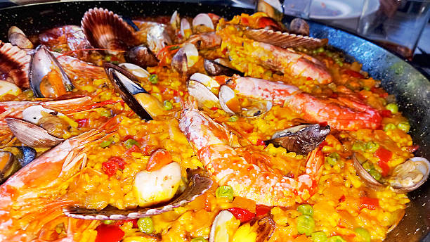 Typical spanish seafood paella, side close-up  view.