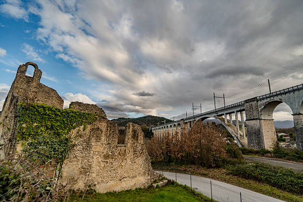 Destroyed in the Allied bombings of 1943, it was rebuilt in its current form. It is supported by two sets of arches separated by a large arch spanning the Carpino River.