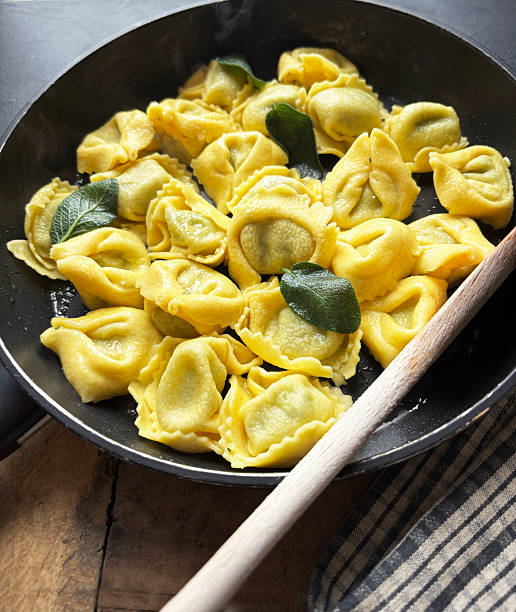 Tortelloni stuffed with ricotta and spinach.