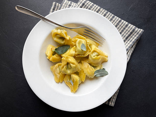 Tortelloni stuffed with ricotta and spinach.