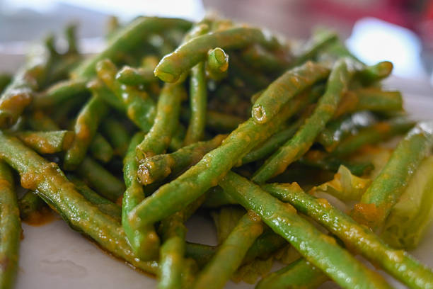 Green beans stir fry with garlic on a plate