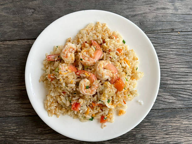 Shrimp fried rice on a wooden table