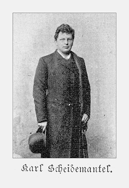 Black and white portrait of Karl Scheidemantel (1859-1923), a celebrated German baritone opera singer. He is depicted in formal attire, holding a hat. The image is a halftone print from the late 19th century, featuring a distinctive dot pattern.
