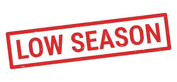Low Season. Grunge rubber stamp for your own design, isolated on a blank background. The stamp consists of text and a frame in red ink. Vector Illustration (EPS file, well layered and grouped). Easy to edit, manipulate, resize or colorize. Vector and Jpeg file of different sizes.