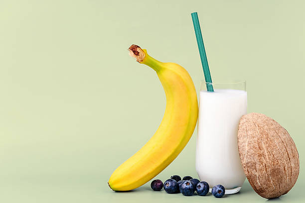 Fresh banana, coconut milk, and blueberries