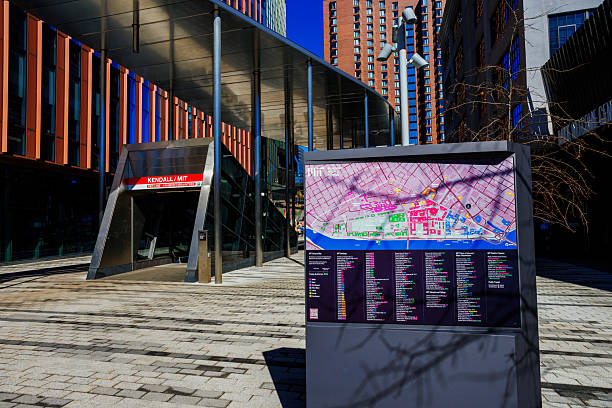 Cambridge, Massachusetts, USA - March 10, 2026: A Massachusetts Institute of Technology campus map and the entrance to the Kendall Square/MIT Red Line Subway Station on the MIT campus and next to Kendall Square Innovation District.
