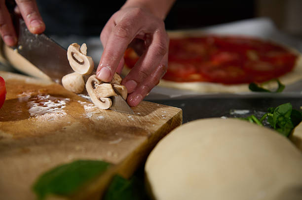 Woman Chef Making Homemade Italian Pizza With Fresh Organic Ingredients