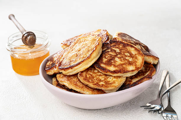 Homemade fluffy pancakes with honey