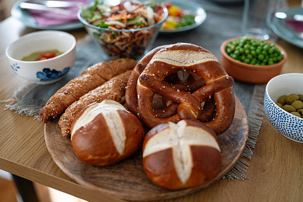 Close-Up of Assorted Bread Rolls and Pastries on Dining Table