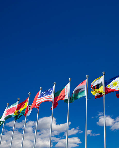 The American flag and the other countries flags are waving