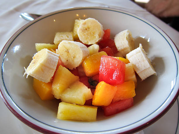 Fresh Tropical Fruit Salad Bowl with Banana and Melon