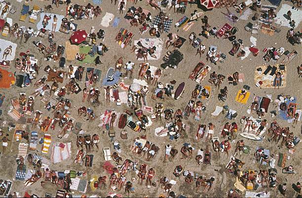 USA (exact location unknown), 1980. People on a beach in midsummer.
