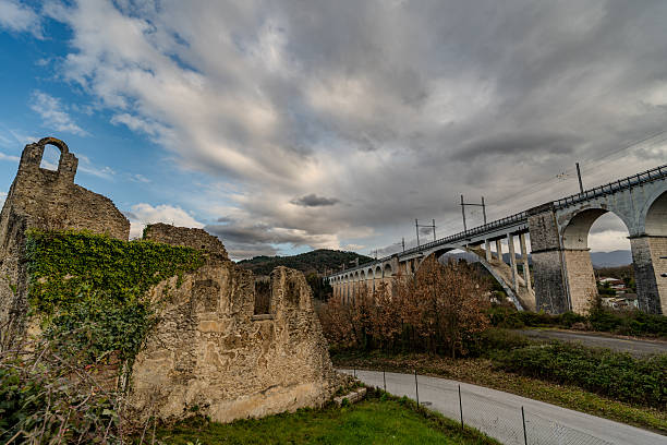 Destroyed in the Allied bombings of 1943, it was rebuilt in its current form. It is supported by two sets of arches separated by a large arch spanning the Carpino River.
