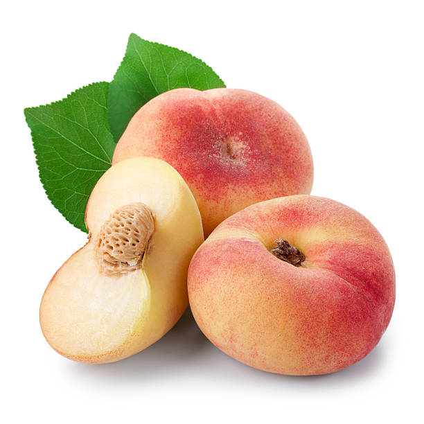 Two ripe fig peach with half