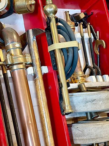 Vintage fire fighting equipment. Row of fireman’s hoses