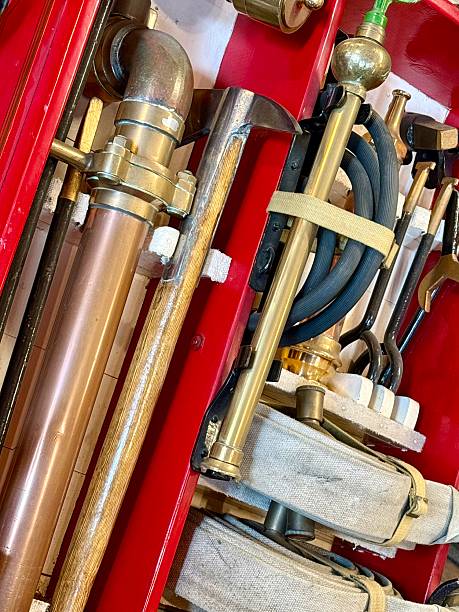 Vintage fire fighting equipment. Row of fireman’s hoses