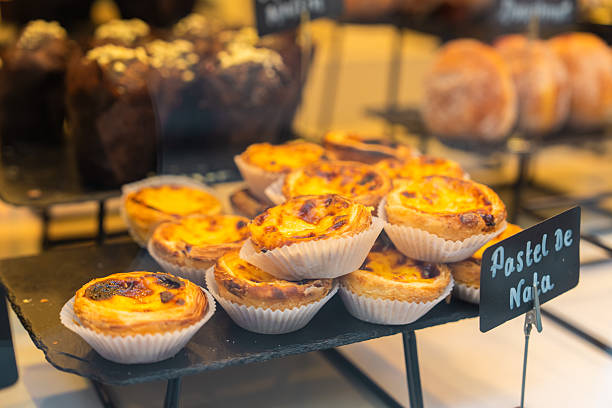 Pastel de nata portuguese custard tarts on display in bakery
