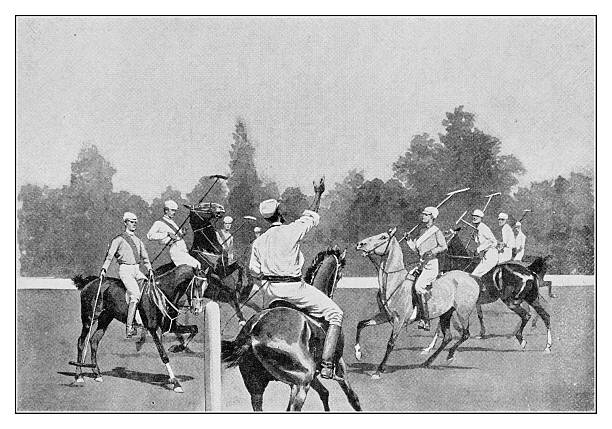Authentic black and white illustration from the 19th century depicting a polo match. A group of players on horseback, holding mallets, wait for the game to begin as a central figure raises his hand. The scene captures the action and tradition of this classic equestrian team sport during the Victorian era.