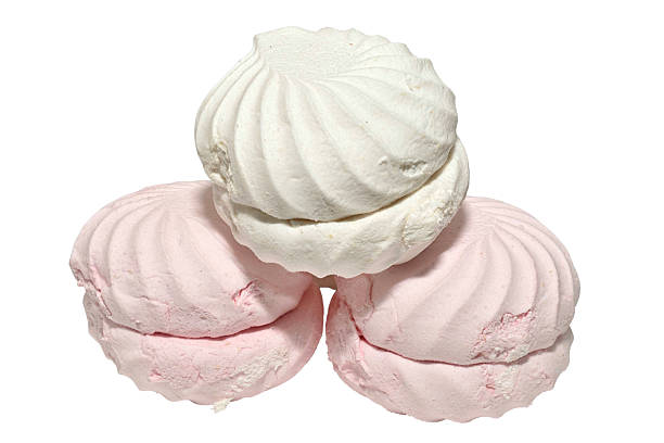 Marshmallow, a confectionery product made from fruit puree, sugar and egg white isolated on white background.
