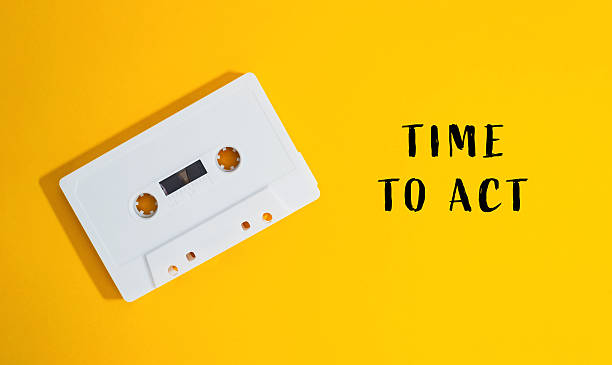 Vintage Cassette Tape on Bright Yellow Background