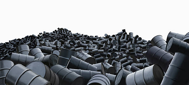 Oil barrels in a dump, white background