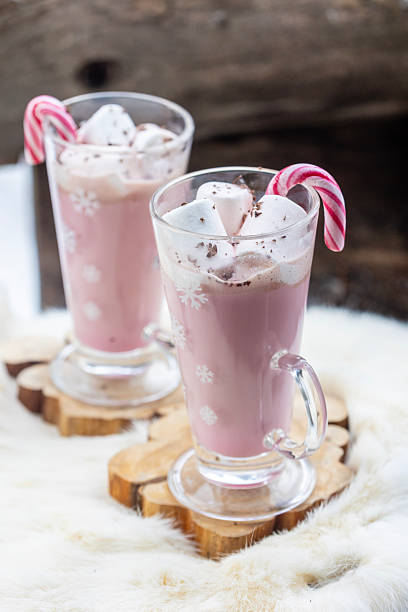 Ruby chocolate hot chocolate with marshmallows and candy canes