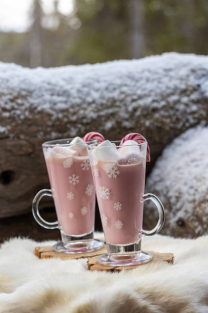 Ruby chocolate hot chocolate with marshmallows and candy canes