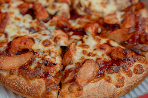 Ham and Cheese Pizza Close Up with Melted Cheese