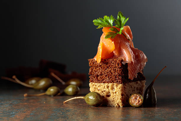 Open sandwich with smoked salmon and capers.