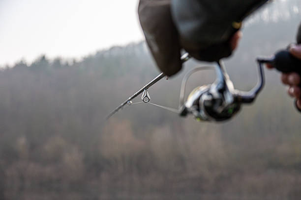 Fishing on the lake at sunset. Fishing background.