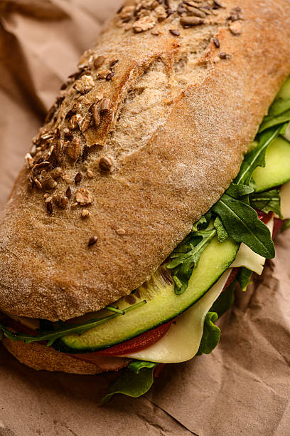Freshly Made Ciabatta Sandwich With Ham, Cheese, and Colorful Vegetables – Close-Up