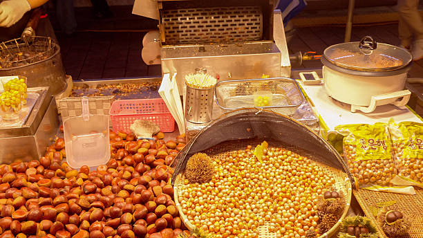 Roasting chestnuts street food stall in Seoul, South Korea