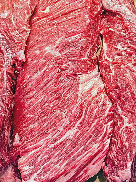 Hanger steak on display on a butcher's market stall