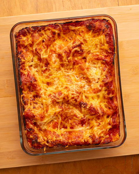 Italian beef lasagna recipe shown step by step to learn how to cook from a top-down perspective.