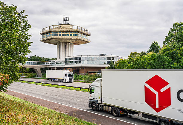Lancashire, UK - A DPD delivery lorry passing another vehicle on the M6 by the Lancaster Forton services.