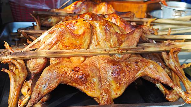 Grilled chicken on a rotisserie.