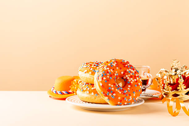Glazed orange donuts for Dutch event Kings day