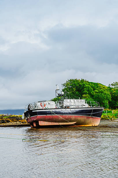 Abandonded shipwrecks on a beach at Isle of Skye