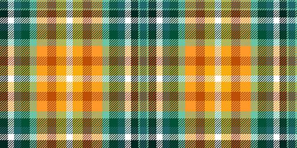 Traditional Scottish tartan in citrus and pine tones. Autumn checkered geometric pattern